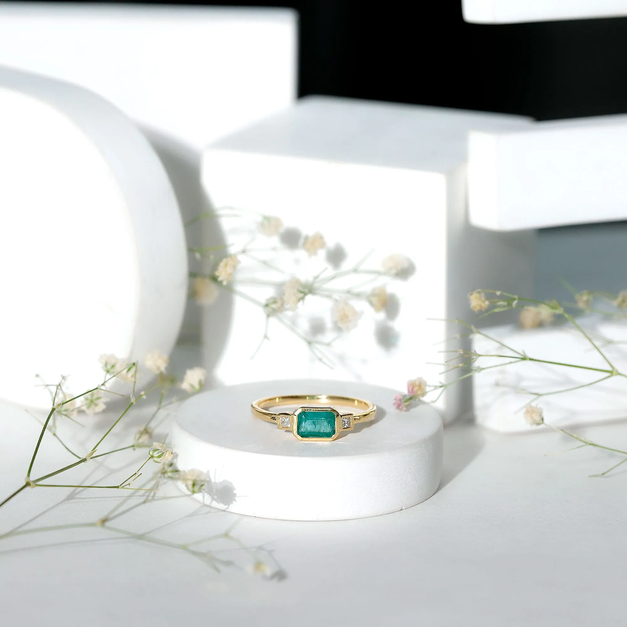 Octagon shape Emerald and Diamond East-West Promise Ring in Bezel Setting