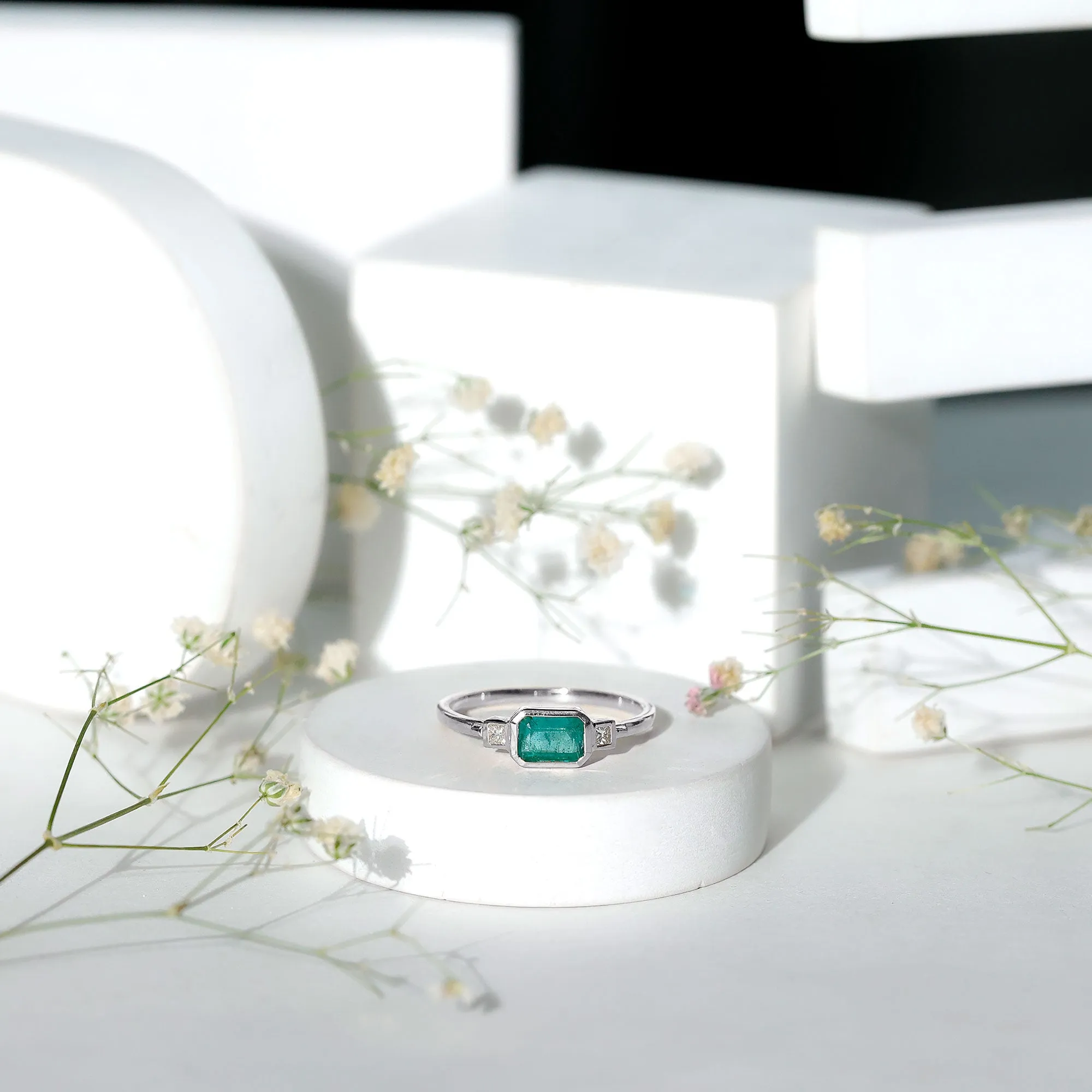 Octagon shape Emerald and Diamond East-West Promise Ring in Bezel Setting