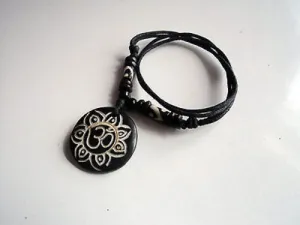 Om In A Flower Bone Pendant Necklace